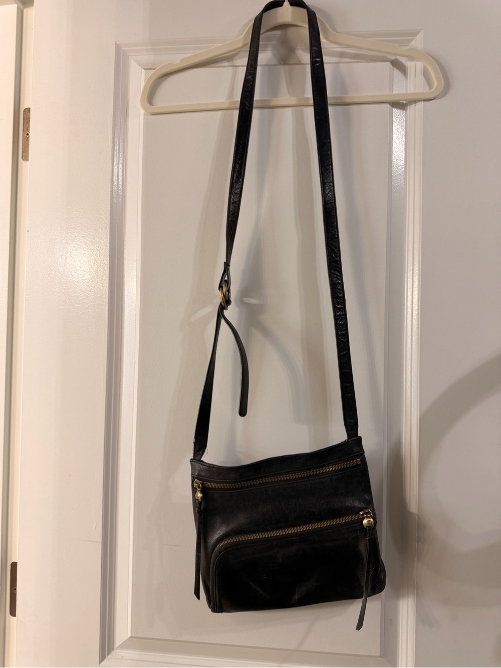HOBO Black Leather Crossbody Bag with Gold Zippers